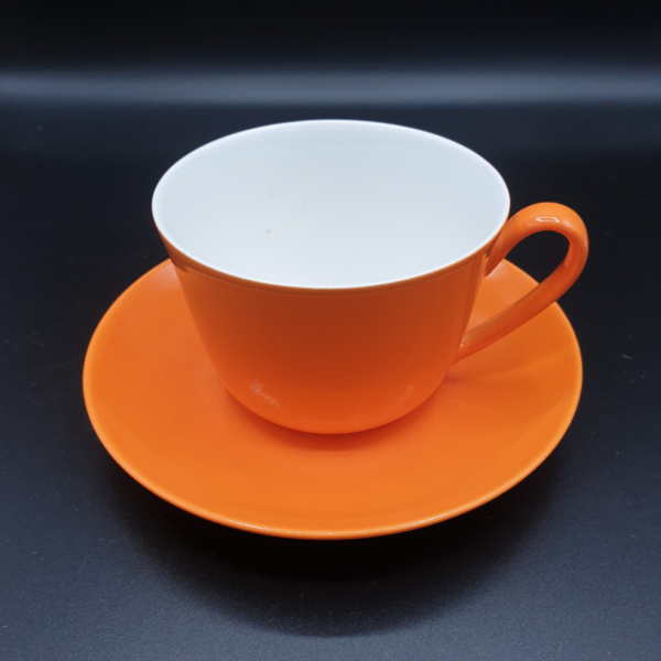 Villeroy & Boch Wonderful World: Kaffeetasse / Tasse mit Unterteller - orange - gut